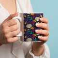 Ceramic Mug 11oz White - Whimsical cream creatures among purple, green, and golden autumn leaves on dark navy background